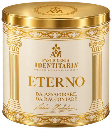 La latta avorio e oro del panettone Eterno, con le colonne classiche